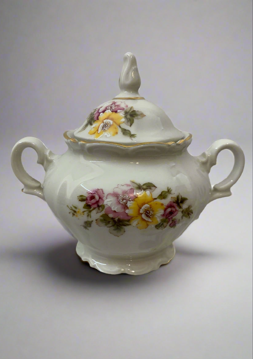 Vintage 1970s Italian porcelain tea set by Tognana with hand-painted floral pattern, 11 cups, 12 saucers, and a sugar bowl with gold trim.