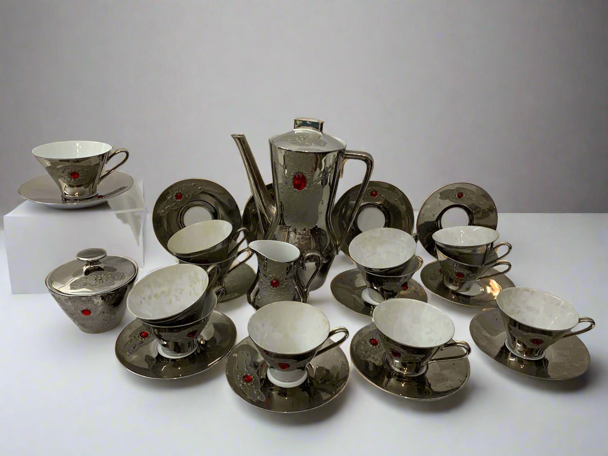 Rare vintage 1960s Bavarian porcelain tea and coffee set with silver finish and red gemstone accents – 27-piece set including cups, saucers, teapot.